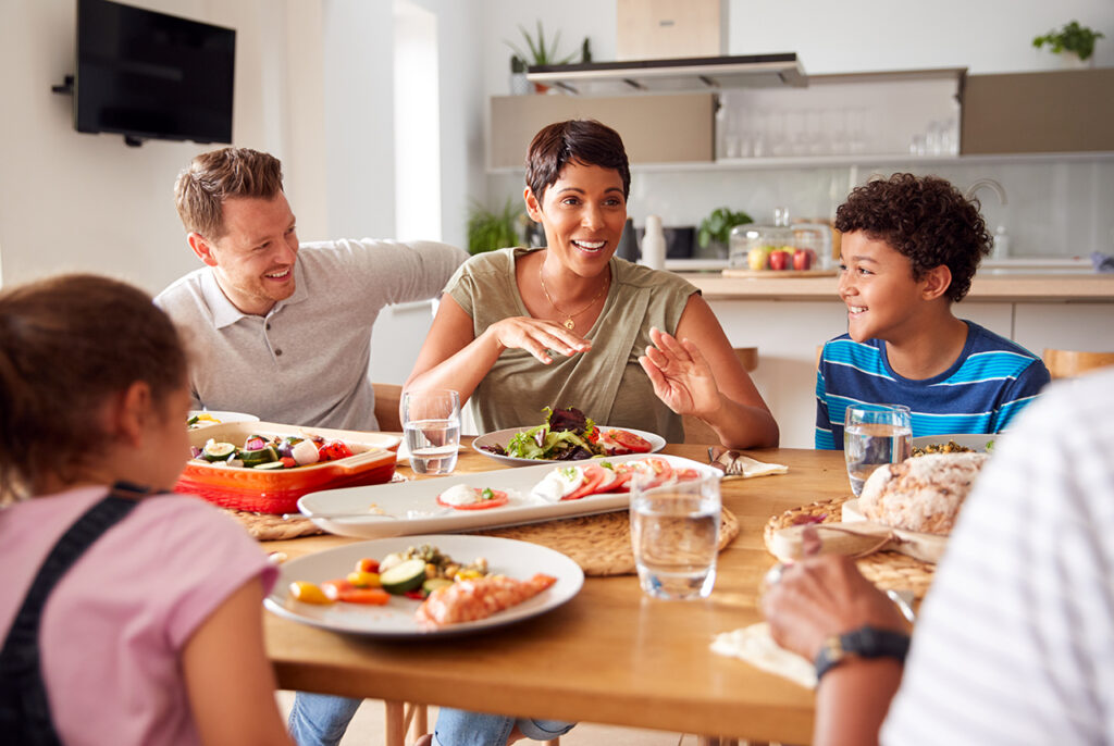 Family have conversation during dinner