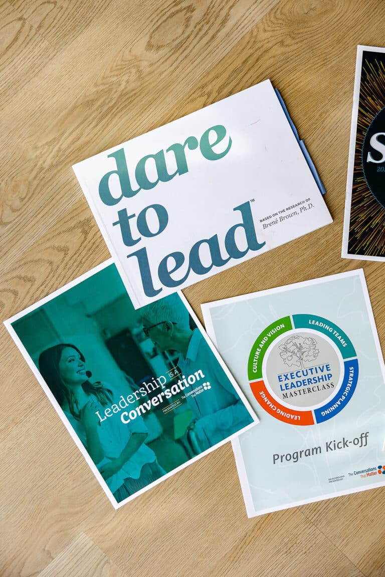 Leadership program materials on table